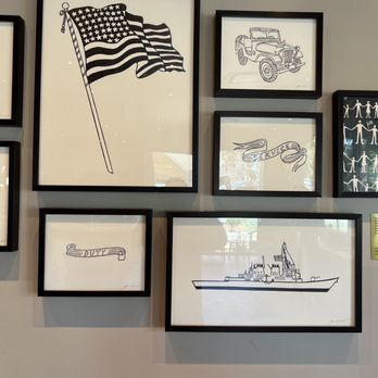 Starbucks - a picture of a wall of framed art - Coffee & Tea Near Me - Port Hueneme, California