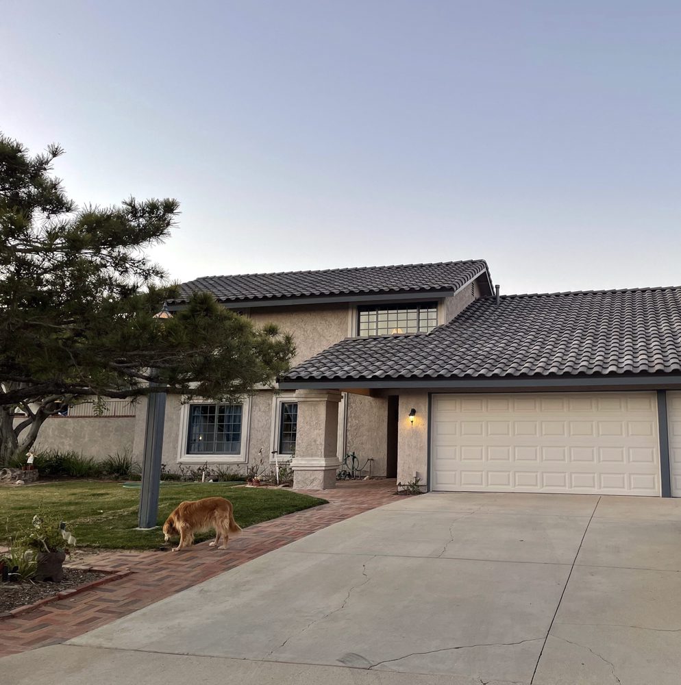 Slide of Van Lund Roofing and Solar