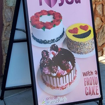 Menchies - A sign showing off the cakes they make with frozen yogurt/froyo! I saw them bring out two beautiful cakes while inside. - Ice Cream & Frozen Yogurt Near Me - Riverbank, California