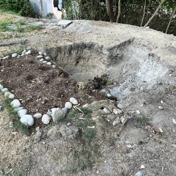 Seattle City Light - Hole left from the pool/pond dug out by the homeless encampment - Electricity Suppliers Near Me - Seattle, Washington Seattle City Light - Hole left from the pool/pond dug out by the homeless encampment - Electricity Suppliers Near Me - Seattle, Washington