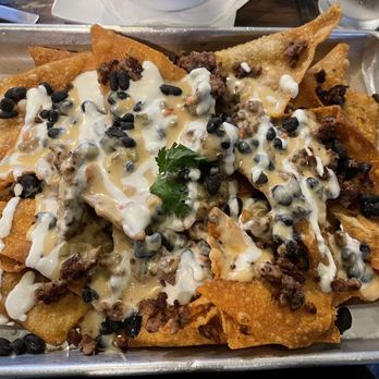 Mo' Brunch & Brews - Loaded Nachos with Wonton Chips and Beyond Meat - Breakfast & Brunch Near Me - Houston, Texas Mo' Brunch & Brews - Loaded Nachos with Wonton Chips and Beyond Meat - Breakfast & Brunch Near Me - Houston, Texas