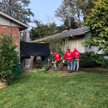 J & R Custom Landscaping - a group of men in red shirts - Landscaping Near Me - Westbury, New York J & R Custom Landscaping - a group of men in red shirts - Landscaping Near Me - Westbury, New York