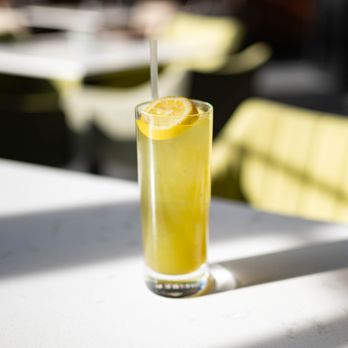 Dive - a glass of lemonade sitting on a table - Cocktail Bars Near Me - Eau Claire, Wisconsin Dive - a glass of lemonade sitting on a table - Cocktail Bars Near Me - Eau Claire, Wisconsin