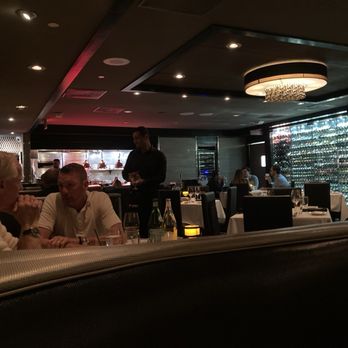 Morton's The Steakhouse - Large wine display and open kitchen plan - Steakhouses Near Me - West Palm Beach, Florida Morton's The Steakhouse - Large wine display and open kitchen plan - Steakhouses Near Me - West Palm Beach, Florida