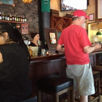 Hennessey's Grill - Having diner at Hennessey's but can't sit at the bar because the waitress is saving  2 spots cor her friends. :-(. - Juice Bars & Smoothies Near Me - Seal Beach, California