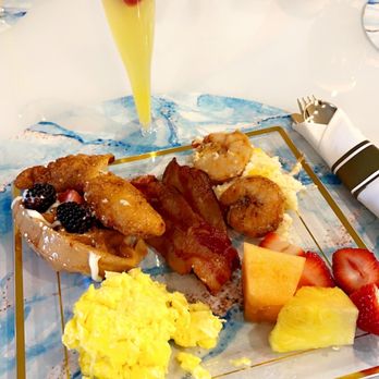 Chefkelvin Catering - Brunch! Chicken and waffles, shrimp and grits, cheesy scrambled eggs, bacon. - Personal Chefs Near Me - Kissimmee, Florida Chefkelvin Catering - Brunch! Chicken and waffles, shrimp and grits, cheesy scrambled eggs, bacon. - Personal Chefs Near Me - Kissimmee, Florida