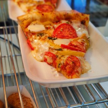 Express Market Ukiah - a slice of pizza on a plate - Pizza Near Me - Ukiah, California