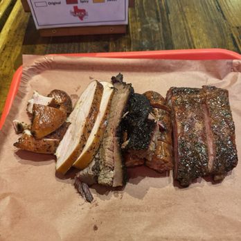 Terry Black's Barbecue - (Left to right) Turkey - brisket - cheddar sausage - pork ribs (a total of $51.86 for this) (instagram: @issa.cheatday) - Barbeque Near Me - Austin, Texas Terry Black's Barbecue - (Left to right) Turkey - brisket - cheddar sausage - pork ribs (a total of $51.86 for this) (instagram: @issa.cheatday) - Barbeque Near Me - Austin, Texas