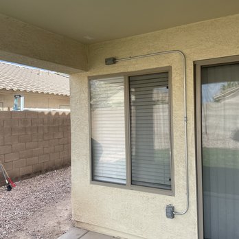 1st Choice Electrical - Installed two outlets in corner near ceiling. One continuous power for a tv, another for string lights linked to recessed light pictured. - Electricians Near Me