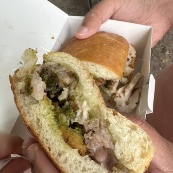 Meat & Bread - two hands holding a sandwich - Sandwiches Near Me - Vancouver, British Columbia Meat & Bread - two hands holding a sandwich - Sandwiches Near Me - Vancouver, British Columbia