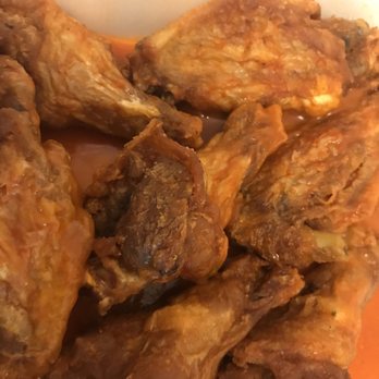 Wing Cave & Grill - To go order medium flavored sauce - Chicken Wings Near Me - Northglenn, Colorado Wing Cave & Grill - To go order medium flavored sauce - Chicken Wings Near Me - Northglenn, Colorado