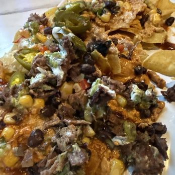 Garage Bar and Grill - Brisket nachos. Good. - New American Near Me - Herriman, Utah Garage Bar and Grill - Brisket nachos. Good. - New American Near Me - Herriman, Utah