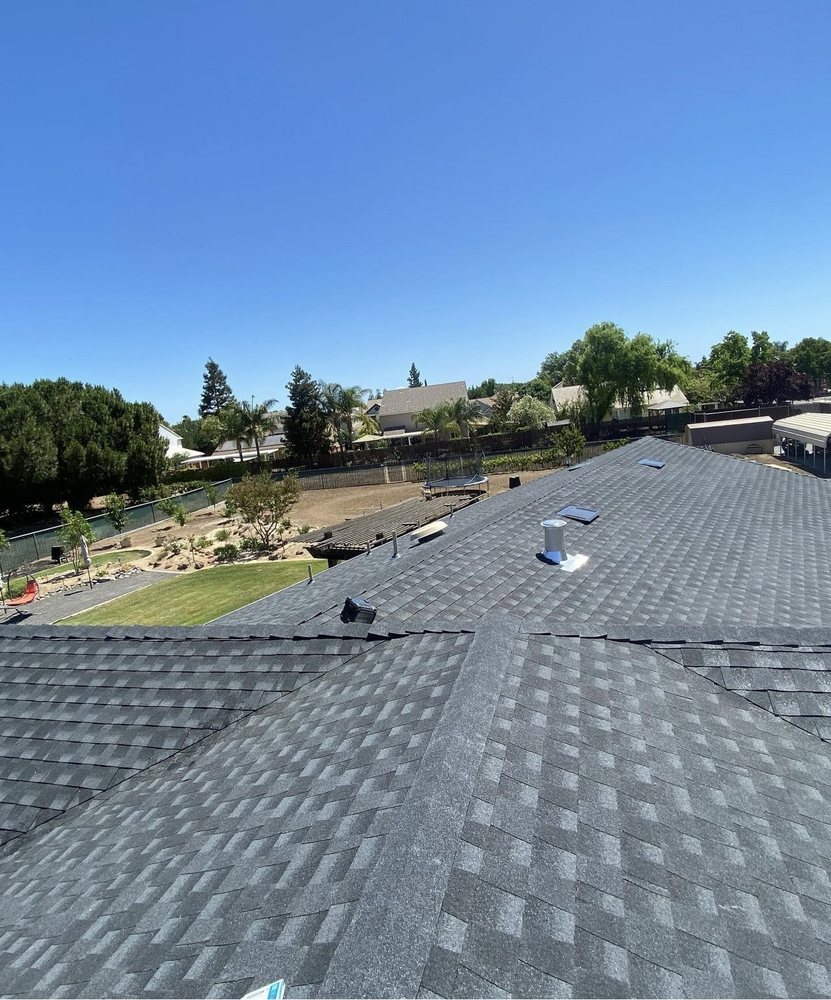 Slide of Cardenas Roofing & Gutter