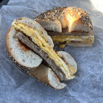 Joels Bagels - Sausage, Egg, and Cheese on an Everything Bagel with Salt, Pepper, Ketchup. - Pizza Near Me - Medford, New York Joels Bagels - Sausage, Egg, and Cheese on an Everything Bagel with Salt, Pepper, Ketchup. - Pizza Near Me - Medford, New York