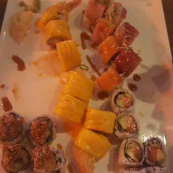 Fancy Sushi - Left: Snoopy, middle: Mango Shrimp, top right: Christmas, lower right: Alaska All delicioud!!! - Japanese Near Me - Clermont, Florida Fancy Sushi - Left: Snoopy, middle: Mango Shrimp, top right: Christmas, lower right: Alaska All delicioud!!! - Japanese Near Me - Clermont, Florida