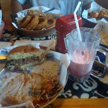 Islands Restaurant - Well done bluenami burger, medium kilauea burger, onion rings , fries, tortilla chips and salsa and guac, and buffalo wings - Burgers Near Me - Seal Beach, California Islands Restaurant - Well done bluenami burger, medium kilauea burger, onion rings , fries, tortilla chips and salsa and guac, and buffalo wings - Burgers Near Me - Seal Beach, California
