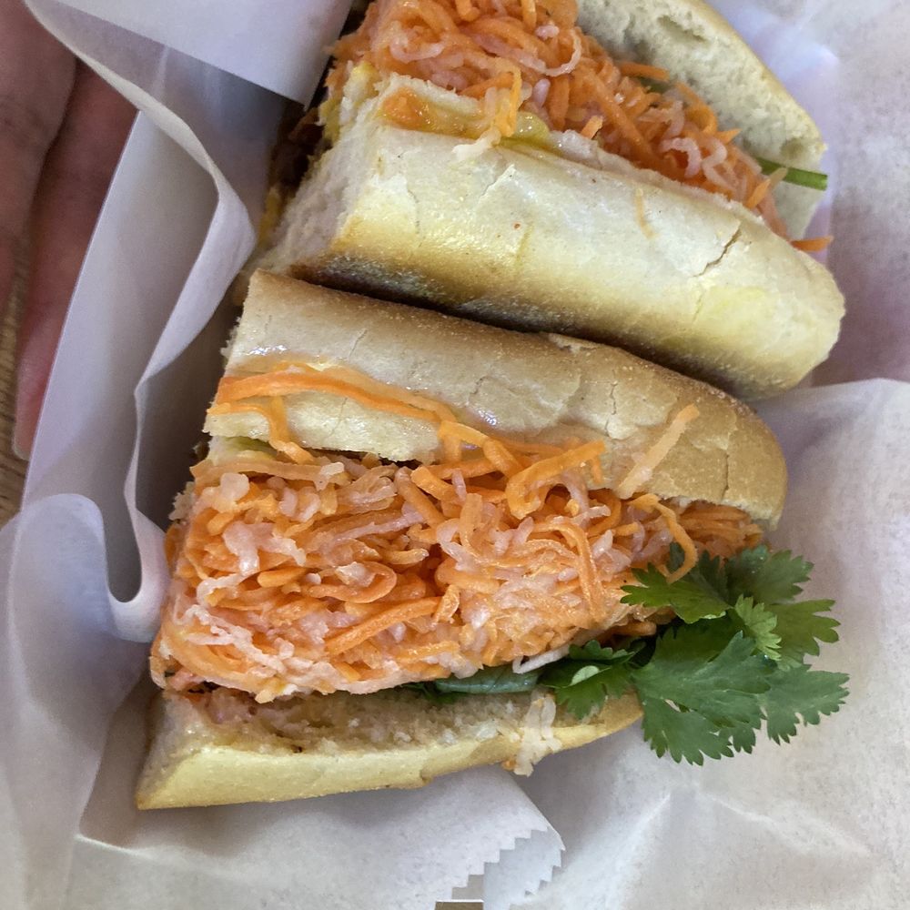 Caramel Pork Banh mi with runny egg Caramel Pork Banh mi with runny egg