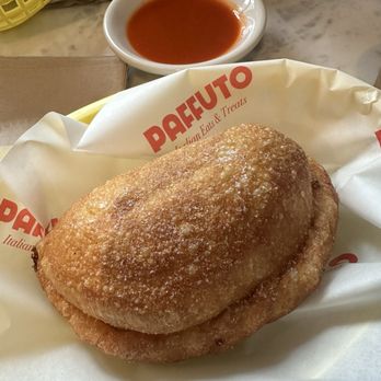 Paffuto - Panzerotti egg and cheese with some hot sauce on the side - Breakfast & Brunch Near Me - Philadelphia, Pennsylvania Paffuto - Panzerotti egg and cheese with some hot sauce on the side - Breakfast & Brunch Near Me - Philadelphia, Pennsylvania