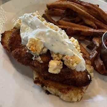 Undercurrent Restaurant - Open face chicken on a biscuit with feta cheese and tzatziki sauce and fries - French Near Me - Greensboro, North Carolina