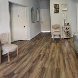 The Skin Sanctuary - Our beautiful lobby.  Feel free to watch a movie and have a complimentary beverage before or after your appointment!