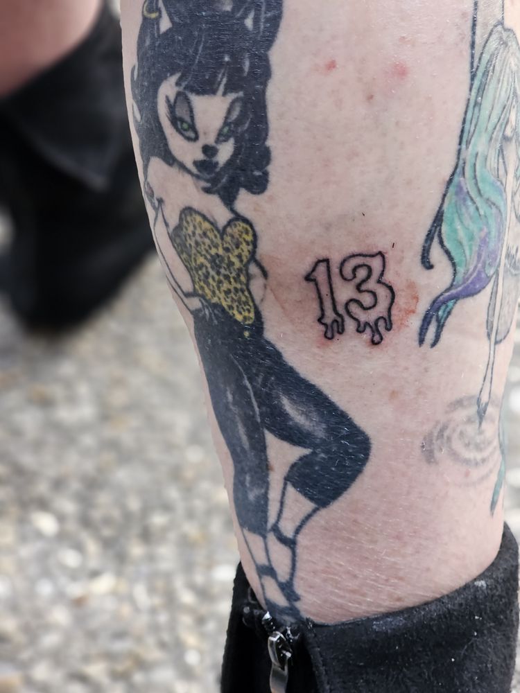 The White Rabbit Tattoo Logo