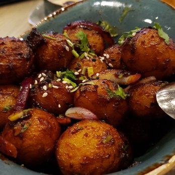 Raag - Chutney glazed potatoes ($14), vegan by default. Meh. Flavor falls flat (a mix of sour & blah). Not crispy. - Indian Near Me - Minneapolis, Minnesota Raag - Chutney glazed potatoes ($14), vegan by default. Meh. Flavor falls flat (a mix of sour & blah). Not crispy. - Indian Near Me - Minneapolis, Minnesota