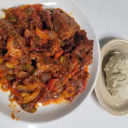 Tam Tam Zings Bar & Grill - Goat plate with a side of fufu