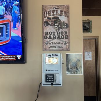 One More Bar - a television and a sign on the wall - Bars Near Me - Lincoln, Nebraska One More Bar - a television and a sign on the wall - Bars Near Me - Lincoln, Nebraska