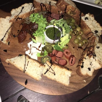 Old Man Rock - This is their cheese plate. It's huge and delicious - Cafes Near Me - Queenstown, OTA Old Man Rock - This is their cheese plate. It's huge and delicious - Cafes Near Me - Queenstown, OTA