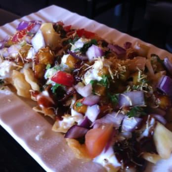 Delhi Heights - Dahi Aloo Papri Chat - Potato, chickpea and crisps in tamarind sauce. - Indian Near Me - Jackson Heights, New York Delhi Heights - Dahi Aloo Papri Chat - Potato, chickpea and crisps in tamarind sauce. - Indian Near Me - Jackson Heights, New York