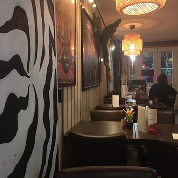 Le New Makossa - interior looking towards front door - African Near Me - Ixelles, BRU Le New Makossa - interior looking towards front door - African Near Me - Ixelles, BRU
