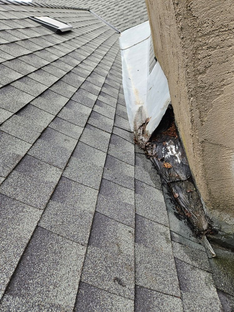 Slide of Green's Roofing