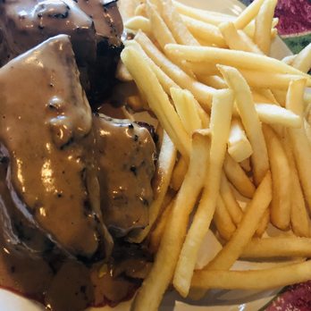 Escargot Bistro - Steak Rossini with fois gras and truffle sauce - French Near Me - Oakland Park, Florida