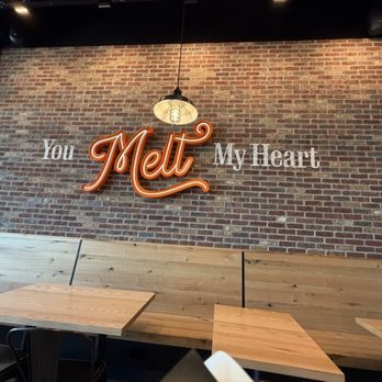 Elite Experience: The Melt - Sign & seating - Yelp Events Near Me - Brea, California