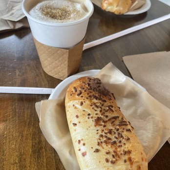 Juan Valdez Cafe - Latte and the Cheese Bun (Cachito de Queso) - Coffee & Tea Near Me - Doral, Florida Juan Valdez Cafe - Latte and the Cheese Bun (Cachito de Queso) - Coffee & Tea Near Me - Doral, Florida