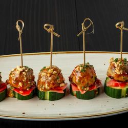 OPAH Seafood Grill - Ginger Chicken Meatballs - Pickled cucumber, ginger, peanut sauce.