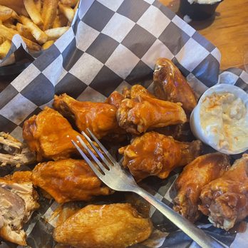 Brick's Pub & Grub - AMAZING Buffalo wings with homemade blue cheese dipping sauce and Cajun fries. - Bars Near Me - Wrenshall, Minnesota Brick's Pub & Grub - AMAZING Buffalo wings with homemade blue cheese dipping sauce and Cajun fries. - Bars Near Me - Wrenshall, Minnesota