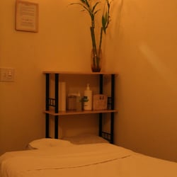 Plus One Spa - Private full-body massage room. Always with fresh linens.