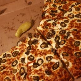 a slice of pizza in a box