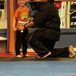 Kiai Martial Arts - Getting his white belt