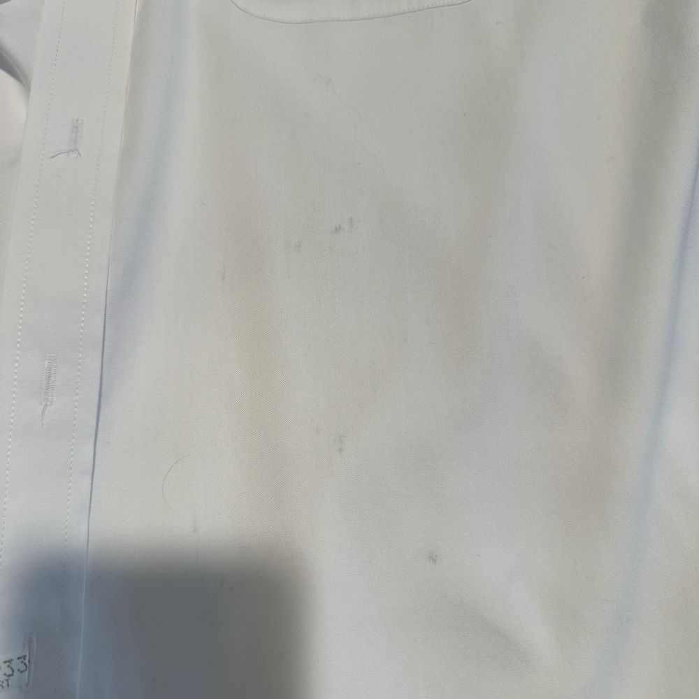 Cary Park Dry Cleaners - Stained shirt. - Dry Cleaning Near Me - Cary, North Carolina