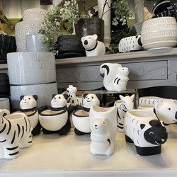 Under the Sun Garden Center - These little planters would be adorable with succulents
