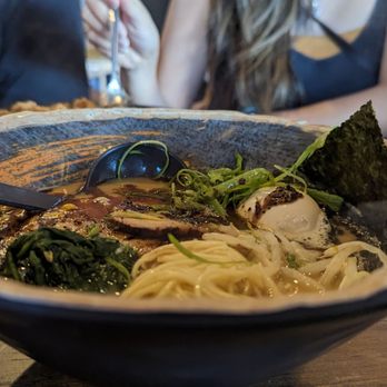 Sizzling House - a bowl of ramen with a spoon in it - Ramen Near Me - Mesa, Arizona
