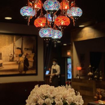 Aracosia McLean - a vase of flowers on a table - Afghan Near Me - McLean, Virginia Aracosia McLean - a vase of flowers on a table - Afghan Near Me - McLean, Virginia