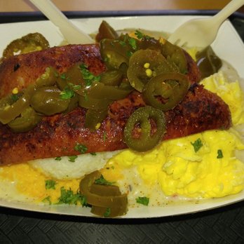 Biscuit Bitch - Amazeballs! Hot mess Bitch. Biscuit and gravy smothered in cheddar cheese with 2 eggs, garlic grits, Louisiana hot link, and jalapenos - Breakfast & Brunch Near Me - Seattle, Washington