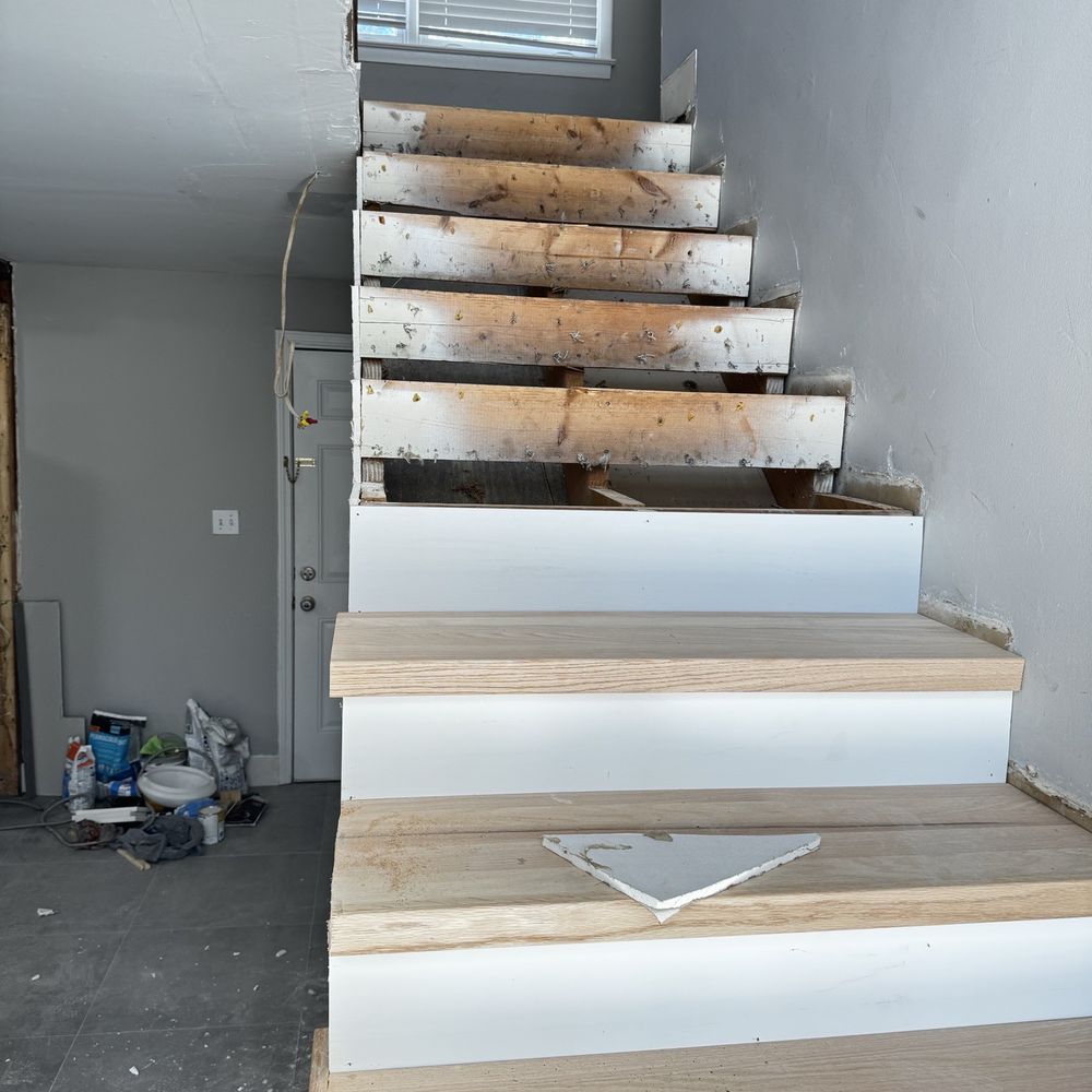 Zurdo Flooring - Look how much of the tread was hanging past the stairs and risers. - Flooring Near Me Zurdo Flooring - Look how much of the tread was hanging past the stairs and risers. - Flooring Near Me