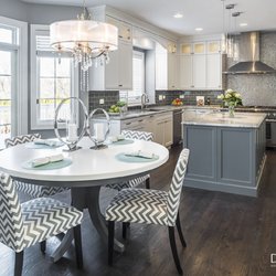 Denori Design - South Barrington - Kitchen with white painted custom cabinets, granite countertop, Thermador appliances and glass backsplash tile.