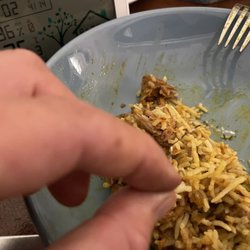 Pot cleaner steel wool strand in the lamb curry.
