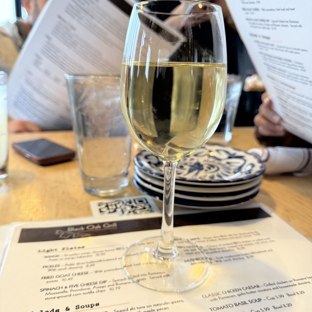 Black Oak Grill - a glass of white wine - American Near Me - Branson, Missouri