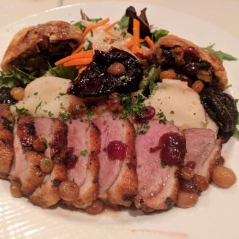 Russian Tea Time - Moulard duck breast, mashed potatoes with poached prunes, raisins, nuts, Madeira wine berry sauce, duck strudel and daikon straw - Russian Near Me - Chicago, Illinois